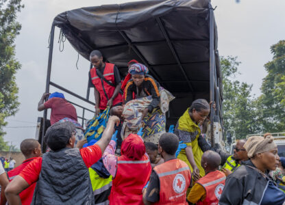 People who crossed from Congo disembark a truck in Gyseny, Rwanda, Tuesday, Jan. 28, 2025, following M23 rebels' advances into eastern Congo's capital Goma. (AP Photo/Yuhi Irakiza)