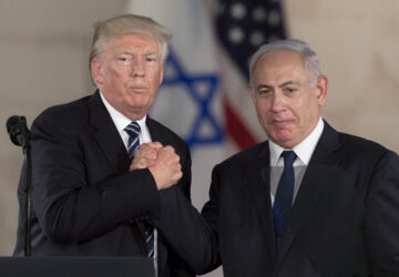 FILE - President Donald Trump and Israeli Prime Minister Benjamin Netanyahu shake hands at The Israel Museum in Jerusalem, May 23, 2017. (AP Photo/Sebastian Scheiner, File)
