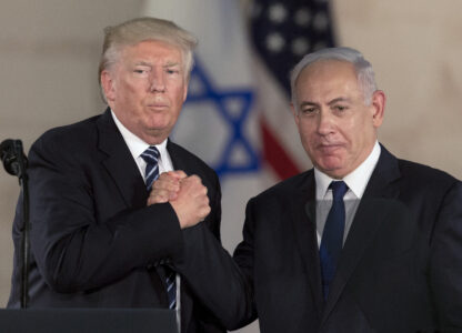 FILE - President Donald Trump and Israeli Prime Minister Benjamin Netanyahu shake hands at The Israel Museum in Jerusalem, May 23, 2017. (AP Photo/Sebastian Scheiner, File)