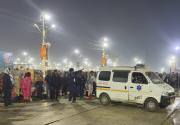 An ambulance leaves the site of a stampede at the Sangam, the confluence of the Ganges, the Yamuna and the mythical Saraswati rivers, on Mauni Amavasya' or new moon day during the Maha Kumbh festival, in Prayagraj, Uttar Pradesh, India, Wednesday, Jan. 29, 2025. (AP Photo/Rajesh Kumar Singh)