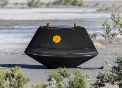 FILE - In this photo provided by NASA, the sample return capsule from NASA's Osiris-Rex mission lies on the ground shortly after touching down in the desert, at the Department of Defense's Utah Test and Training Range on Sept. 24, 2023. (Keegan Barber/NASA via AP, file)