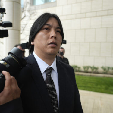 Ippei Mizuhara, former interpreter for Los Angeles Dodgers baseball star Shohei Ohtani arrives at federal court for bank and tax fraud sentencing on Thursday, Feb. 6, 2025, in Santa Ana, Calif. (AP Photo/Damian Dovarganes)