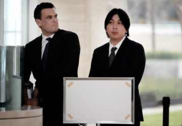 Ippei Mizuhara, right, former interpreter for Los Angeles Dodgers baseball star Shohei Ohtani arrives at federal court with his attorney Michael G. Freedman for sentencing for bank and tax fraud on Thursday, Feb. 6, 2025, in Santa Ana, Calif. (AP Photo/Damian Dovarganes)