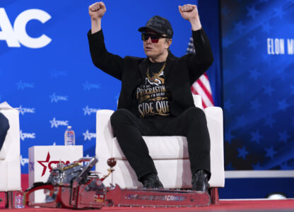 Elon Musk gestures during the Conservative Political Action Conference, CPAC, at the Gaylord National Resort & Convention Center, Thursday, Feb. 20, 2025, in Oxon Hill, Md. (AP Photo/Jose Luis Magana)