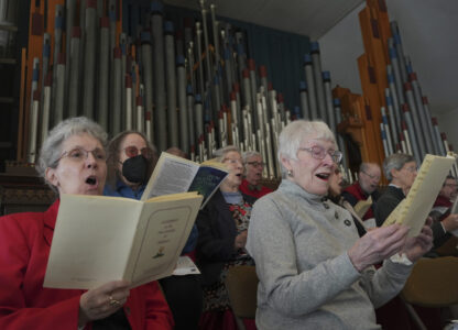FILE - Members of the choir at Central Moravian Church sing at a 