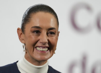 Mexican President Claudia Sheinbaum gives her morning news conference at the national palace in Mexico City, Monday, Feb. 3, 2025. (AP Photo/Marco Ugarte)