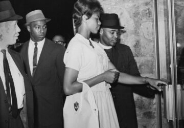 FILE - Olympic sprint star Wilma Rudolph tries unsuccessfully to be served at a restaurant in her hometown of Clarksville, Tenn., along with 300 others, on May 30, 1963. With her are, from left: Dr. F.D. Coleman, Dr. Paul Dumas and the Rev. Carl Liggin, chairman of the local Christian Leadership Council. (AP Photo/File)