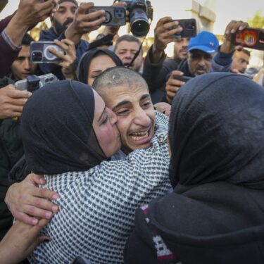 Mohammed Sahloul, 17, is greeted by his sister Nidaa after being released from an Israeli prison in Khan Younis, Gaza Strip, Thursday, Feb. 27, 2025. (AP Photo/Abdel Kareem Hana)