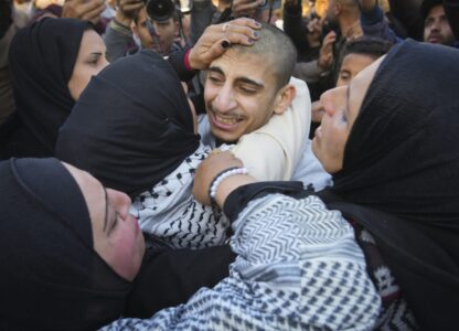 Mohammed Sahloul, 17, is greeted by relatives after being released from a 420 days detention in an Israeli prison in Khan Younis, Gaza Strip, Thursday, Feb. 27, 2025. (AP Photo/Abdel Kareem Hana)