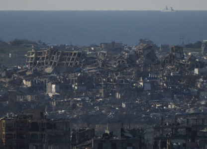 Buildings destroyed during the Israeli air and ground offensive are seen in the Gaza Strip from southern Israel, Sunday, March 2, 2025. (AP Photo/Leo Correa)