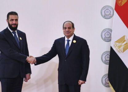 In this photo provided by Egypt's presidency media office, Egyptian President Abdel-Fattah el-Sissi, greets Syria's interim President Ahmad al-Sharaa during the emergency Arab summit at Egypt's New Administrative Capital, just outside Cairo, Tuesday, March 4, 2025. (Egyptian Presidency Media Office via AP)