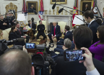 Vice President JD Vance, center right, speaks with Ukrainian President Volodymyr Zelenskyy, center left, as President Donald Trump, center, listens in the Oval Office at the White House, Friday, Feb. 28, 2025, in Washington. (AP Photo/ Mystyslav Chernov)