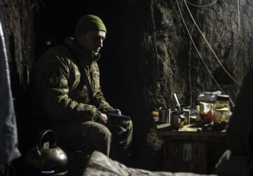 A Ukrainian serviceman sits in a shelter on his position at the frontline near Donetsk, Ukraine, Monday, March 3, 2025. (AP Photo/Roman Chop)