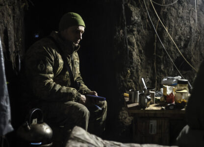 A Ukrainian serviceman sits in a shelter on his position at the frontline near Donetsk, Ukraine, Monday, March 3, 2025. (AP Photo/Roman Chop)