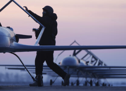 A Ukrainian serviceman of the Defence Intelligence prepares to launch long-range drones An-196 Liutyi in undisclosed location, Ukraine, Feb. 28, 2025. (AP Photo/Evgeniy Maloletka)