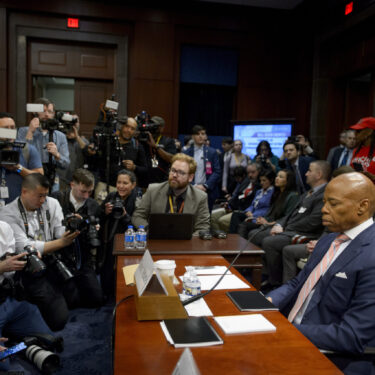 New York City Mayor Eric Adams takes his seat at the witness table during a House Committee on Oversight and Government Reform hearing with Sanctuary City Mayors on Capitol Hill, Wednesday, March 5, 2025, in Washington. (AP Photo/Rod Lamkey, Jr.)