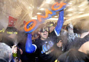 FILE - The New York Mets celebrate in the clubhouse after defeating the Philadelphia Phillies in Game 4 of the National League divisional baseball playoff series, Wednesday, Oct. 9, 2024, in New York. (AP Photo/Frank Franklin II, FIle)