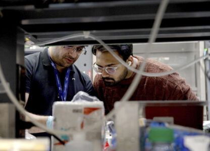 Lab workers at Johns Hopkins University work in Richard Huganir's lab in Baltimore, Md., on Feb. 26, 2025. (AP Photo/Shelby Lum)
