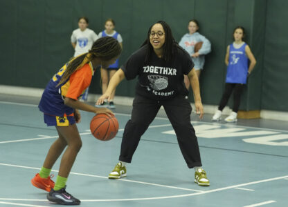 Coach Beulah Osueke works with the Chestnut Hill Youth Sports Club Lightning 6th grade girls basketball team in Philadelphia, Monday, Feb. 3, 2025. (AP Photo/Matt Rourke)