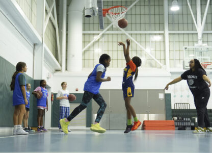 Coach Beulah Osueke works with the Chestnut Hill Youth Sports Club Lightning 6th grade girls basketball team in Philadelphia, Monday, Feb. 3, 2025. (AP Photo/Matt Rourke)