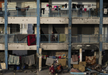 Displaced Palestinians live in a school run by UNRWA, the U.N. agency helping Palestinian refugees, west of Gaza City, Sunday, March 9, 2025. (AP Photo/Jehad Alshrafi)