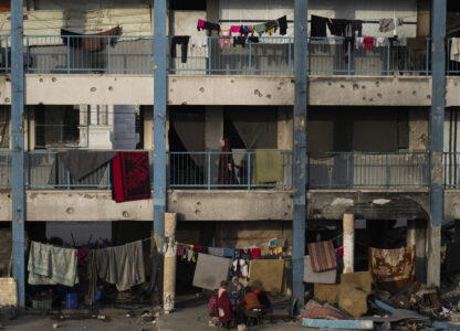 Displaced Palestinians live in a school run by UNRWA, the U.N. agency helping Palestinian refugees, west of Gaza City, Sunday, March 9, 2025. (AP Photo/Jehad Alshrafi)