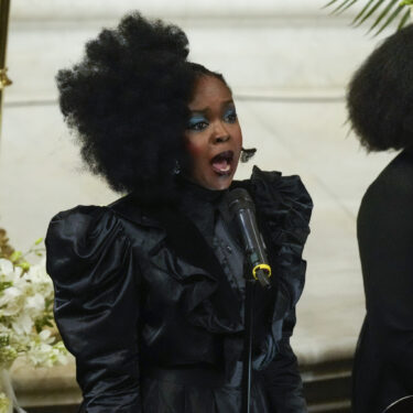 Lauryn Hill performs during a ceremony in celebration of Roberta Flack's life at The Abyssinian Baptist Church on Monday, March 10, 2025, in New York. (AP Photo/Richard Drew)