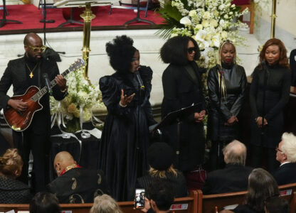 Wyclef Jean, left, and Lauryn Hill of the Fugees perform during a ceremony in celebration of Roberta Flack's life at The Abyssinian Baptist Church on Monday, March 10, 2025, in New York. (AP Photo/Richard Drew)
