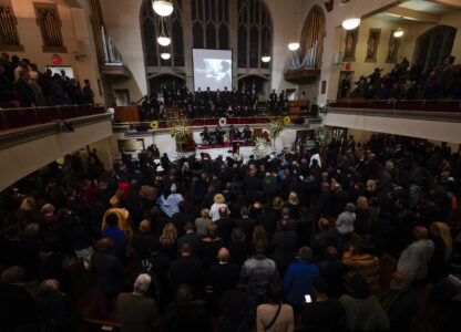 Senior Pastor of The Abyssinian Baptist Church, Reverend Dr. Kevin R. Johnson gives the benediction during a ceremony in celebration of Roberta Flack's life at The Abyssinian Baptist Church on Monday, March 10, 2025, in New York. (AP Photo/Richard Drew)