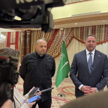 Ukrainian Head of Presidential Office Andriy Yermak, right, and Ukrainian Minister of Defense Rustem Umerov speak to journalists in Jeddah, Saudi Arabia, Tuesday, March 11, 2025. (AP Photo/Baraa Anwer)