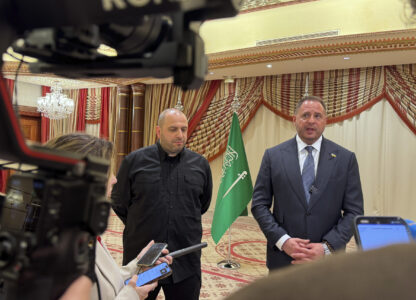 Ukrainian Head of Presidential Office Andriy Yermak, right, and Ukrainian Minister of Defense Rustem Umerov speak to journalists in Jeddah, Saudi Arabia, Tuesday, March 11, 2025. (AP Photo/Baraa Anwer)