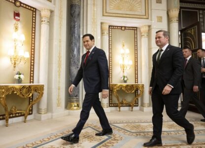 U.S. Secretary of State Marco Rubio, left, and U.S. National Security Advisor Mike Waltz arrive to speak with the media following meetings with a Ukrainian delegation in Jeddah, Saudi Arabia, March 11, 2025. (Saul Loeb/Pool Photo via AP)