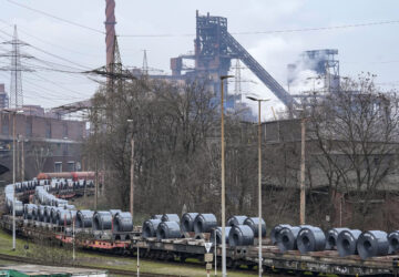 FILE - Steel on coil cars ahead of transport at the main factory of struggling steel producer thyssenkrupp in Duisburg, Germany, Tuesday, Feb. 4, 2025. (AP Photo/Martin Meissner, File)