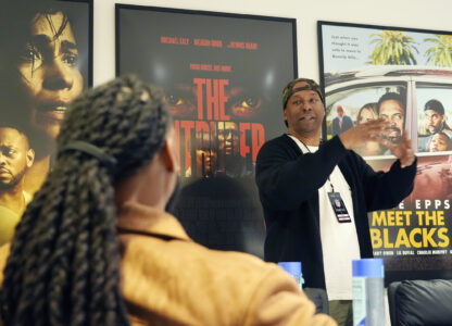 Filmmaker and former professional basketball player Deon Taylor, right, discusses the movie industry with NFL player Trayvon Henderson during a filmmaking workshop for NFL players on Tuesday, March 4, 2025, in Santa Monica, Calif. (AP Photo/Chris Pizzello)