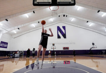 Northwestern freshman Kat Righeimer, one of six women from Kobe Bryant’s Mamba Academy going through their first experience with college basketball, drives to the basket during NCAA college basketball practice in Evanston, Ill., Tuesday, Feb. 25, 2025. (AP Photo/Nam Y. Huh)