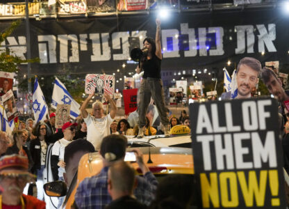 Protesters demand the release of hostages held in the Gaza Strip, in Tel Aviv, Israel, Tuesday, March 18, 2025. (AP Photo/Ariel Schalit)