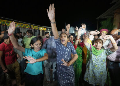 Villagers dance as they celebrate the safe return of NASA astronaut Suni Williams, also known as Sunita Williams, from the International Space Station (ISS), at a temple in her ancestral village Jhulasan in Mehsana district of Gujarat state, India, Wednesday, March 19, 2025. (AP Photo/Ajit Solanki)