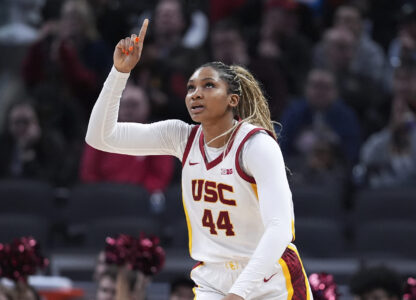 Southern California forward Kiki Iriafen (44) reacts to a play against UCLA during the second half of an NCAA college basketball game in the championship of the Big Ten Conference tournament in Indianapolis, Sunday, March 9, 2025. (AP Photo/Michael Conroy)