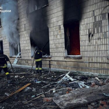 In this photo provided by the Ukrainian Emergency Service on Wednesday, March 19, 2025, firefighters work on a site of a Russian attack in Krasnopillia, Sumy region, Ukraine. (Ukrainian Emergency Service via AP)
