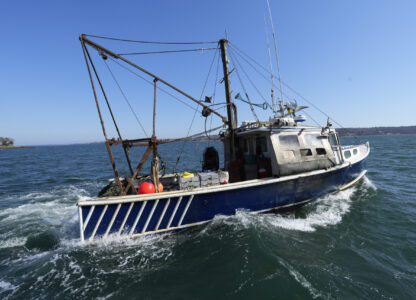 A scallop fishing boat leaves the dock, Tuesday, March 11, 2025, in Yarmouth, Maine. (AP Photo/Robert F. Bukaty)