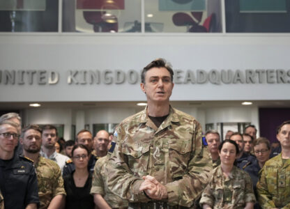 General Nick Perry Chief of Joint Operations, left speaks during a visit of Britain's Prime Minister Keir Starmer at a military base to meet planners mapping out next steps in the Coalition of the Willing in Northwood, London, Thursday, March 20, 2025.(AP Photo/Alastair Grant, Pool)