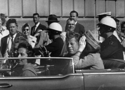 FILE - This Nov. 22, 1963 file photo shows President John F. Kennedy riding in motorcade with first lady Jacqueline Kenndy in Dallas, Texas. (AP Photo, file)