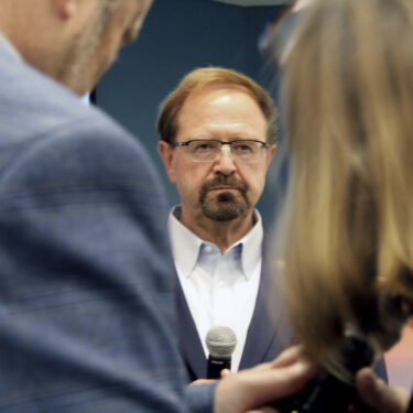 FILE - Rep. Chuck Edwards talks during a town hall in Asheville, N.C., March 13, 2025. (AP Photo/Makiya Seminera, File)