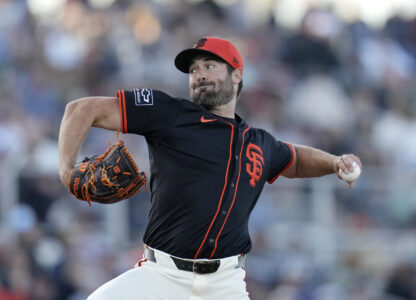 San Francisco Giants starting pitcher Robbie Ray throws against the San Diego Padres during the first inning of a spring training baseball game Tuesday, March 18, 2025, in Scottsdale, Ariz. (AP Photo/Ross D. Franklin)