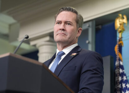 FILE - White House National Security Adviser Mike Waltz listens to a question from a reporter in the James Brady Press Briefing Room at the White House in Washington, Feb. 20, 2025. (AP Photo/Alex Brandon, File)