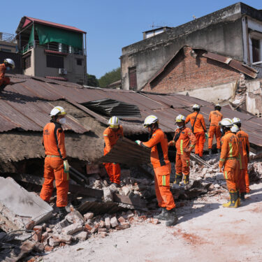 Rescuers work through rubble of a collapsed building following Friday's earthquake in Naypyitaw, Myanmar, Tuesday, April 1, 2025. (AP Photo)