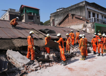 Rescuers work through rubble of a collapsed building following Friday's earthquake in Naypyitaw, Myanmar, Tuesday, April 1, 2025. (AP Photo)