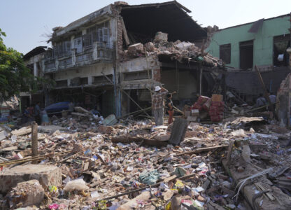People inspect their homes, damaged following Friday's earthquake in Naypyitaw, Myanmar, Tuesday, April 1, 2025. (AP Photo)
