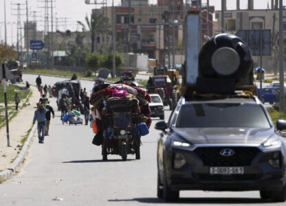 Displaced Palestinians, who flee from Rafah, arrive in Khan Younis, Gaza, on Monday, March 31, 2025, after the Israeli military issued sweeping evacuation orders covering most of Rafah. (AP Photo/Abdel Kareem Hana)