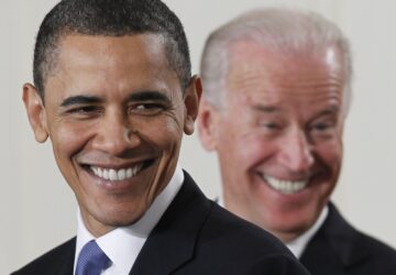 President Barack Obama and Vice President Joe Biden smile in the East Room of the White House in Washington, Tuesday, March 23, 2010, before the president signed the health care bill. (AP Photo/Charles Dharapak)